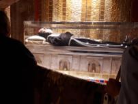 Padre Pio, people cry, pray to, and leave lots of money at his dead body that then just gets taken by the church. It's an interesting view on religion...